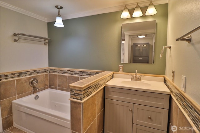 full bath with crown molding, a garden tub, and vanity
