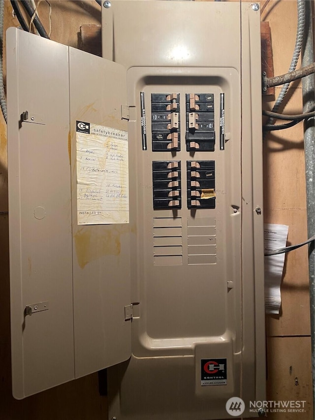 utility room featuring electric panel