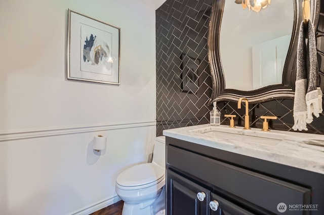 3123 240th Ave NE, Sammamish, WA 98074 - bathroom with vanity, decorative backsplash, and toilet