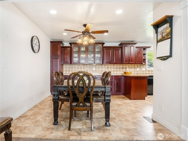 dining area with baseboards, a ceiling fan, recessed lighting, and visible vents