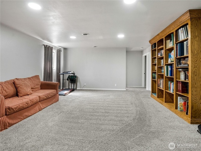 living area featuring carpet flooring, recessed lighting, and baseboards