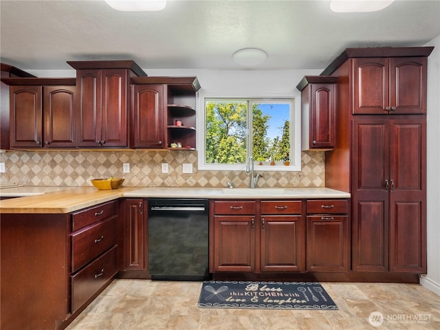 kitchen with light countertops, black dishwasher, and dark brown cabinets