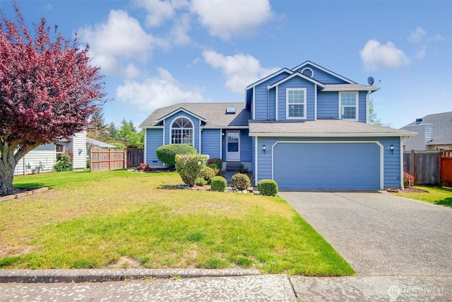 tri-level home featuring fence, concrete driveway, a front yard, and a garage