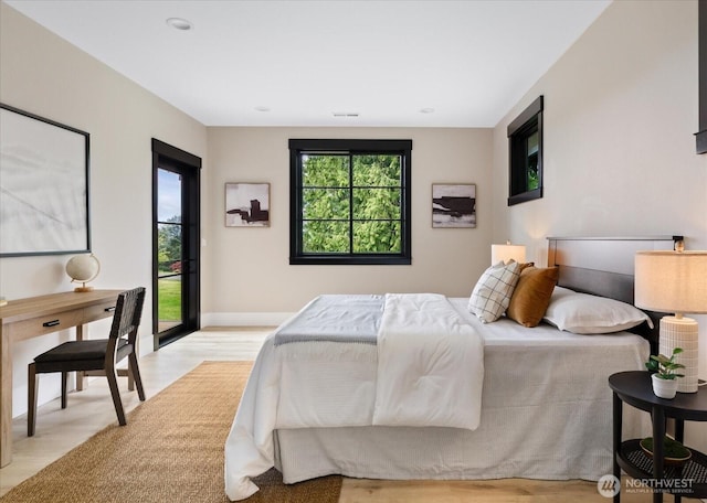 4306 Quaternary Rd, Clinton, WA 98236 - bedroom featuring access to exterior, recessed lighting, baseboards, light wood-type flooring, and visible vents