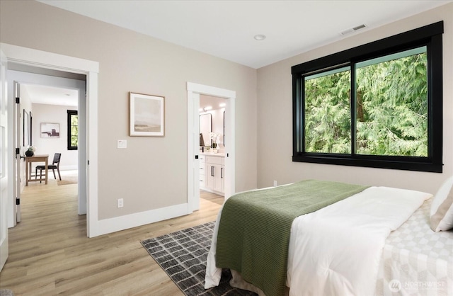 4306 Quaternary Rd, Clinton, WA 98236 - bedroom featuring baseboards, light wood-type flooring, and visible vents