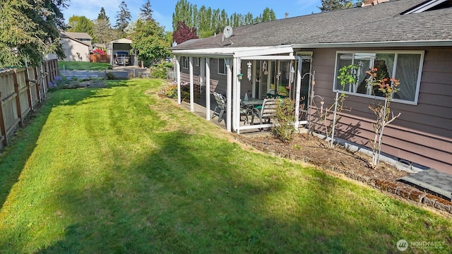 view of yard featuring fence