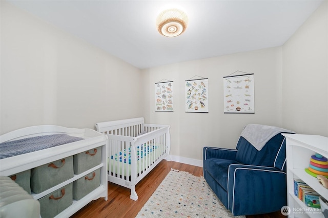 209 W 3rd St, Cle Elum, WA 98922 - bedroom featuring baseboards and wood finished floors