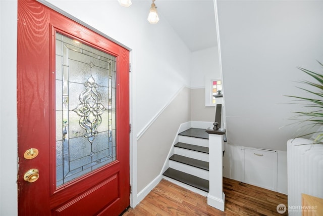 209 W 3rd St, Cle Elum, WA 98922 - entryway with radiator, stairs, and wood finished floors