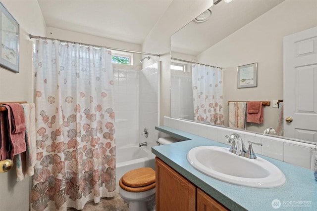 full bath with vanity, shower / bath combo with shower curtain, and toilet