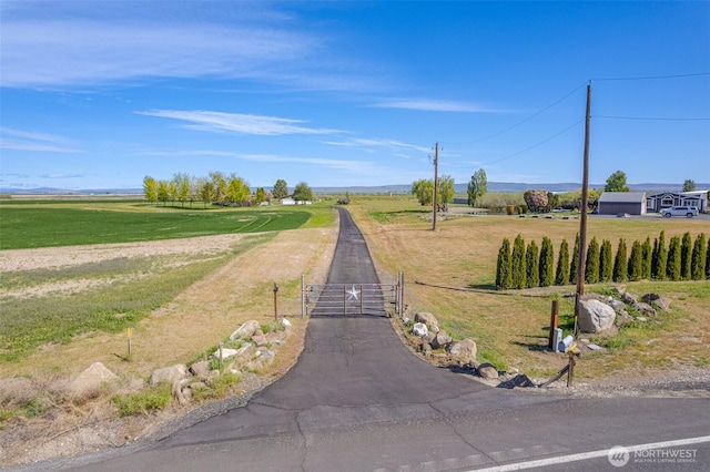 view of road with a gate