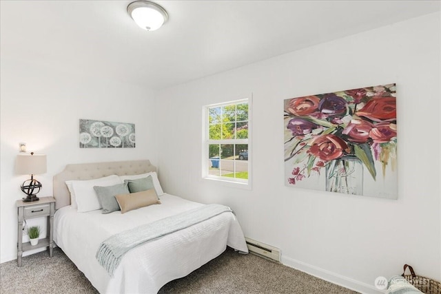 bedroom with baseboards, carpet flooring, and baseboard heating
