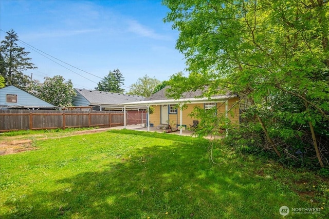view of yard with a patio area and fence