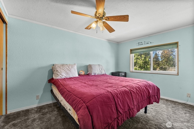 bedroom with crown molding, carpet floors, baseboards, and a ceiling fan