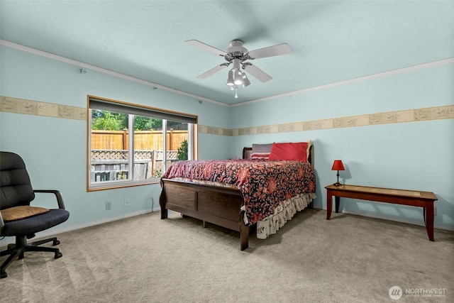 bedroom featuring carpet floors, ceiling fan, and baseboards