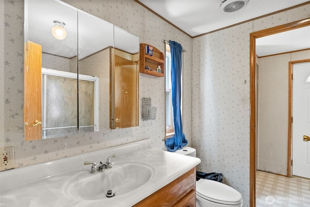 full bath with crown molding, vanity, toilet, wallpapered walls, and visible vents