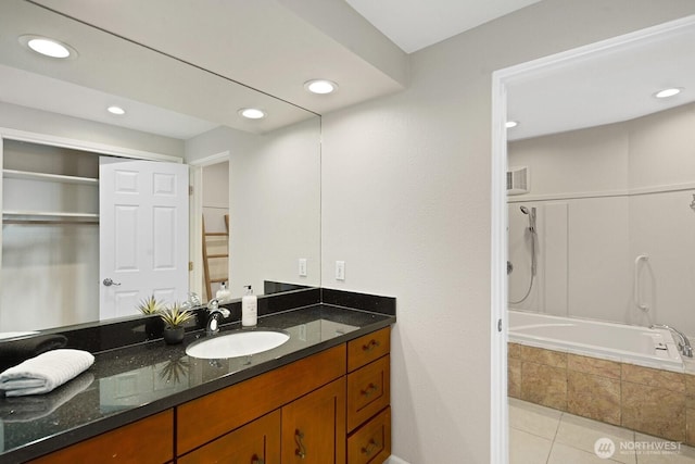 bathroom with vanity, recessed lighting, and tile patterned floors