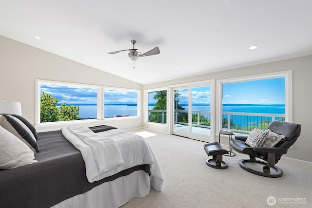 carpeted bedroom featuring vaulted ceiling, a water view, ceiling fan, recessed lighting, and access to outside