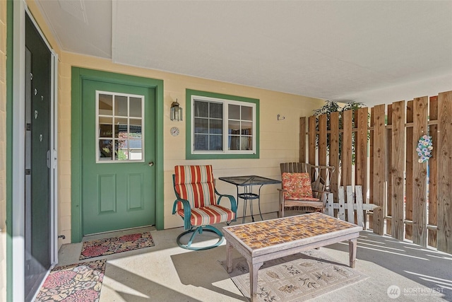 property entrance with fence