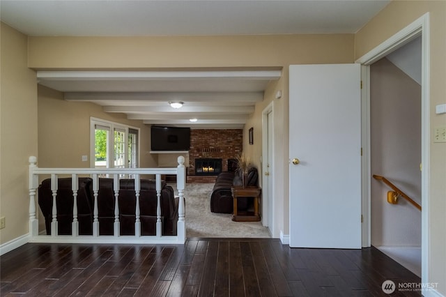 958 Abbott Rd, Walla Walla, WA 99362 - hallway featuring beamed ceiling, baseboards, an upstairs landing, and wood finished floors