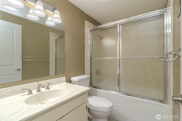 958 Abbott Rd, Walla Walla, WA 99362 - full bath with vanity, shower / bath combination with glass door, and toilet
