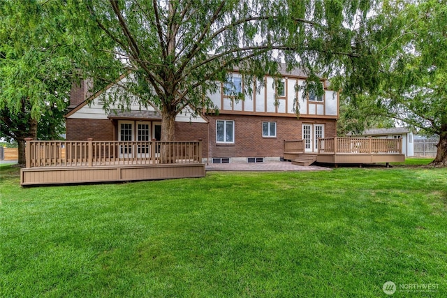 958 Abbott Rd, Walla Walla, WA 99362 - back of property with brick siding, a lawn, french doors, and a deck
