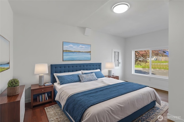 22516 45th Ave E, Spanaway, WA 98387 - bedroom featuring baseboards and wood finished floors