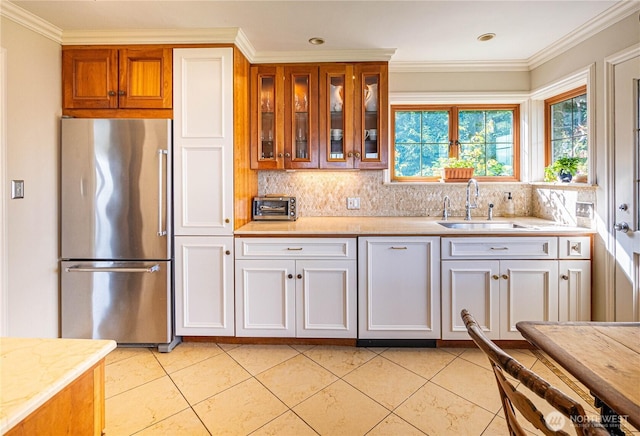 8314 Island Dr S, Seattle, WA 98118 - kitchen with freestanding refrigerator, a sink, backsplash, and light tile patterned floors