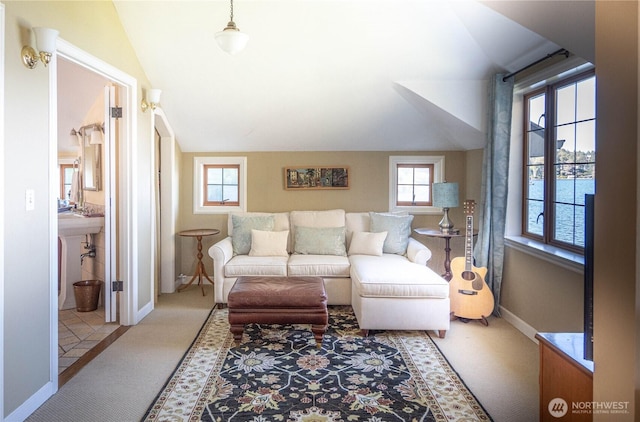 8314 Island Dr S, Seattle, WA 98118 - living room featuring baseboards, carpet, and vaulted ceiling