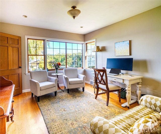 8314 Island Dr S, Seattle, WA 98118 - office area featuring baseboards, wood finished floors, and visible vents