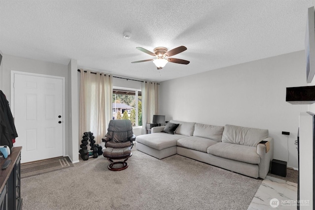 1718 33rd St SE, Auburn, WA 98002 - living room featuring ceiling fan, a textured ceiling, and baseboards