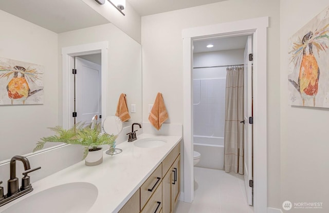 1502 S Kelvin Ct, East Wenatchee, WA 98802 - bathroom featuring double vanity, toilet, shower / tub combo, and tile patterned flooring