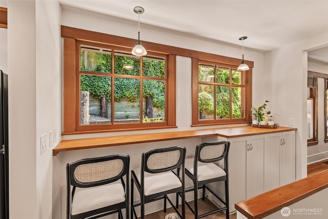 interior space featuring hanging light fixtures