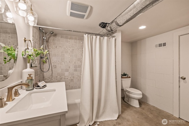 full bath featuring visible vents, vanity, concrete flooring, toilet, and shower / bath combo