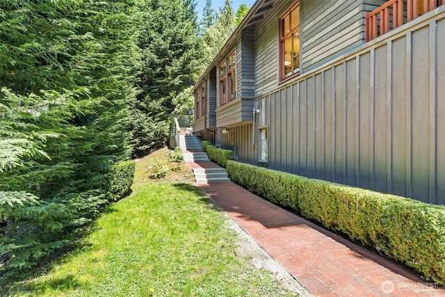 view of yard featuring stairway