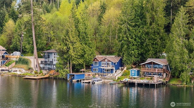 23821 S Lake Roesiger Rd, Snohomish, WA 98290 - drone / aerial view featuring a water view and a forest view