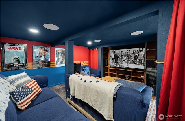 23821 S Lake Roesiger Rd, Snohomish, WA 98290 - home theater room with built in shelves, recessed lighting, and wood finished floors