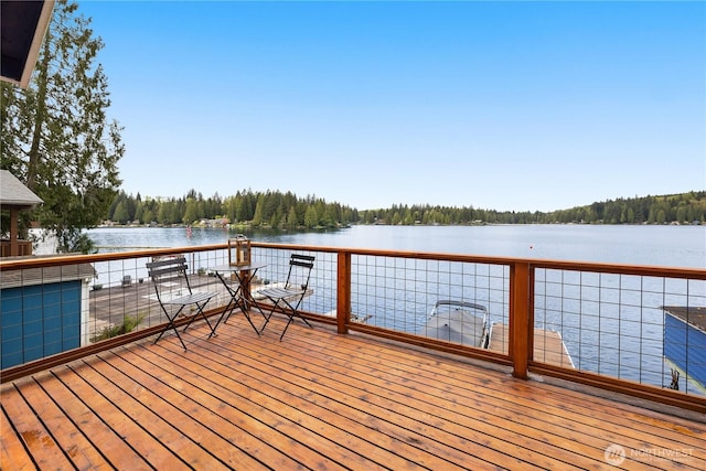 23821 S Lake Roesiger Rd, Snohomish, WA 98290 - wooden deck featuring a water view