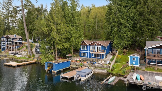 23821 S Lake Roesiger Rd, Snohomish, WA 98290 - view of dock featuring a deck with water view, stairs, boat lift, and a balcony