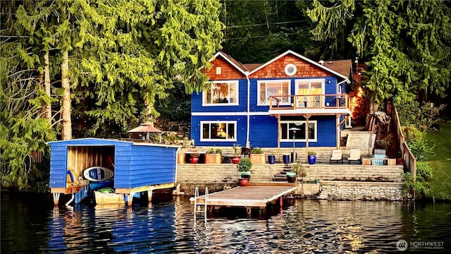23821 S Lake Roesiger Rd, Snohomish, WA 98290 - back of property featuring a water view and a balcony