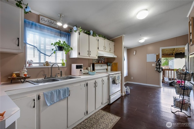 kitchen featuring a sink, white electric stove, white cabinets, and light countertops