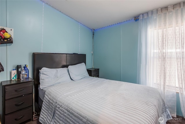 bedroom featuring multiple windows