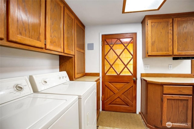 4995 Johnson St NW, Bremerton, WA 98311 - clothes washing area featuring cabinet space and washer and clothes dryer