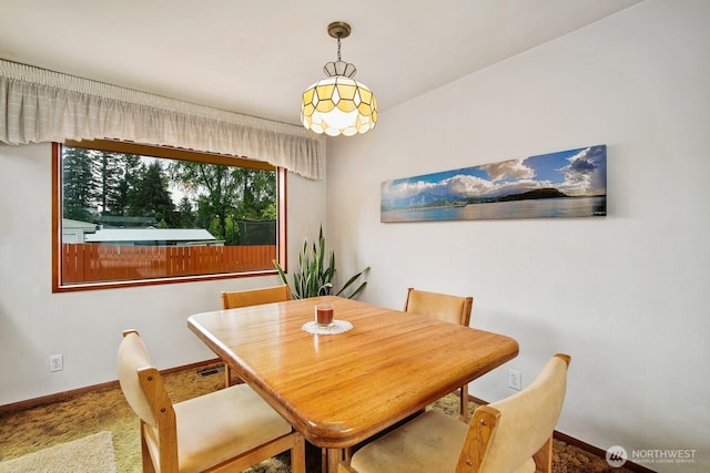 4995 Johnson St NW, Bremerton, WA 98311 - dining room featuring baseboards and carpet flooring