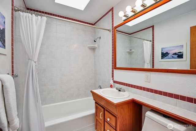 4995 Johnson St NW, Bremerton, WA 98311 - full bath with a skylight, vanity, and shower / bath combination with curtain