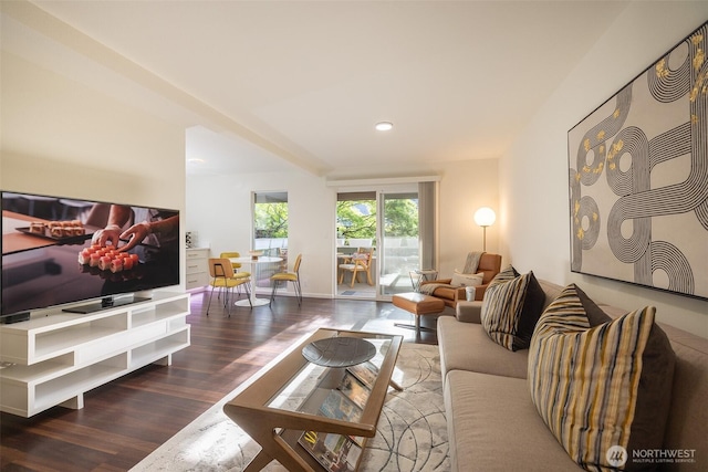living room featuring baseboards, recessed lighting, and wood finished floors