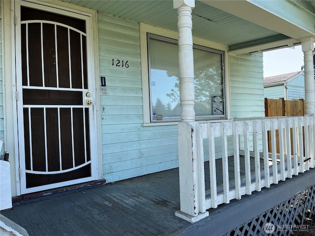 entrance to property with covered porch