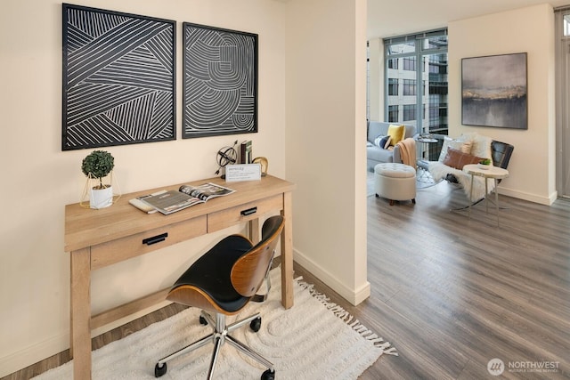 819 Virginia Unit 1104, Seattle, WA 98101 - home office with baseboards and wood finished floors