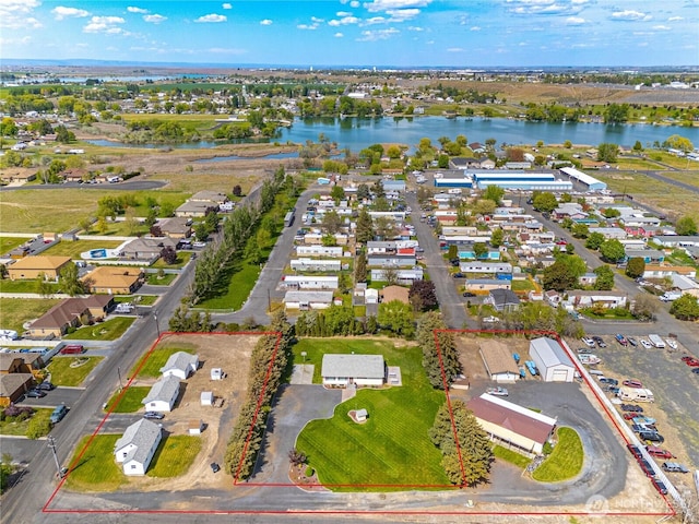 aerial view with a water view and a residential view