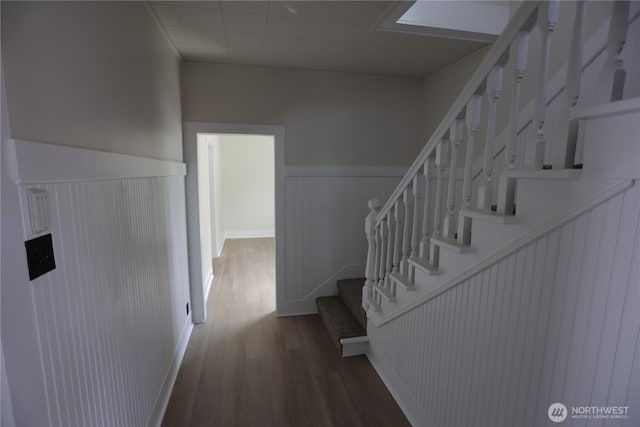 422 Chenault Ave, Hoquiam, WA 98550 - stairway featuring wood finished floors and a wainscoted wall