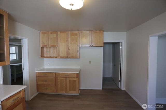 422 Chenault Ave, Hoquiam, WA 98550 - kitchen with light countertops, baseboards, and dark wood-style flooring